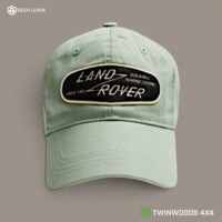 Land Rover Grasmere Green cap Red Canoe front